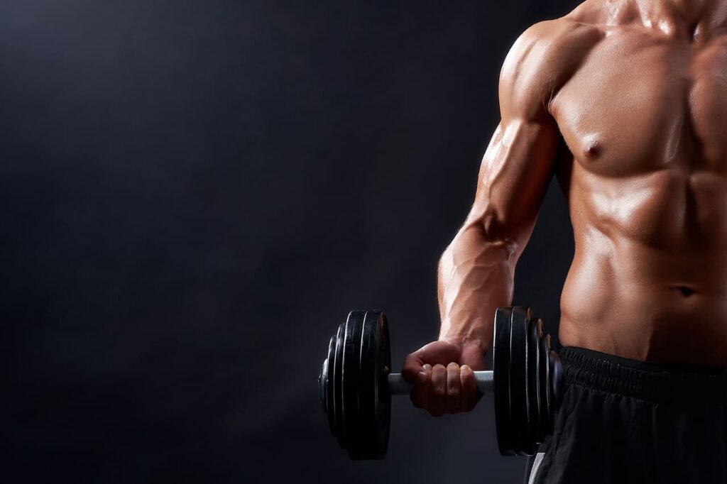 young-fitness-man-in-studio